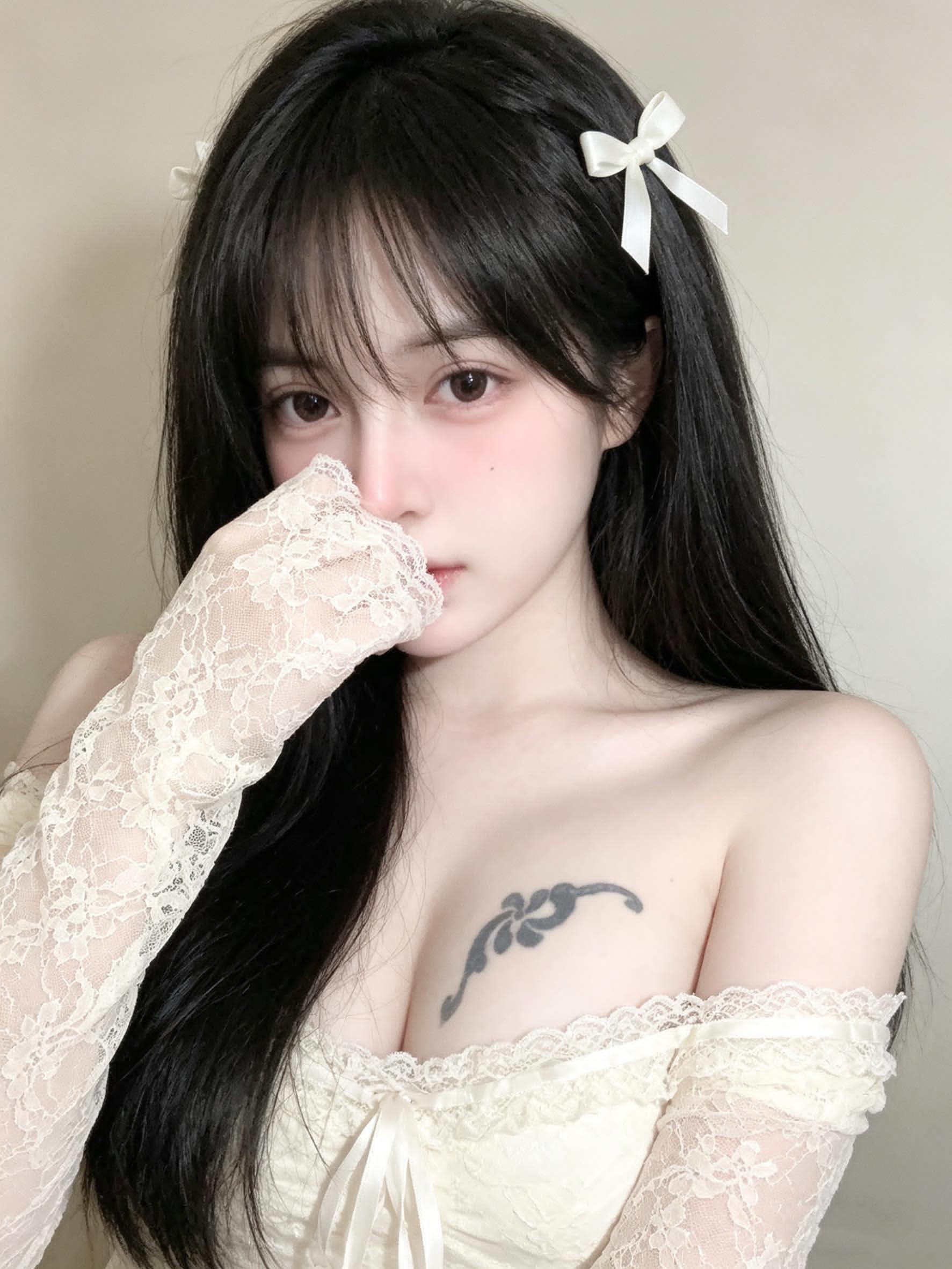 Pretty Asian girl contemplating